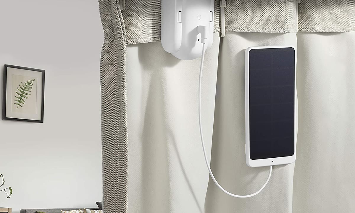 Solar Panel for Curtain 3 placed near a bright curtain with USB-C cable connected
