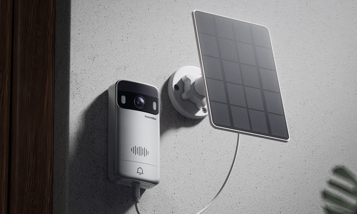 Solar Panel connected to a SwitchBot Video Doorbell on an exterior wall